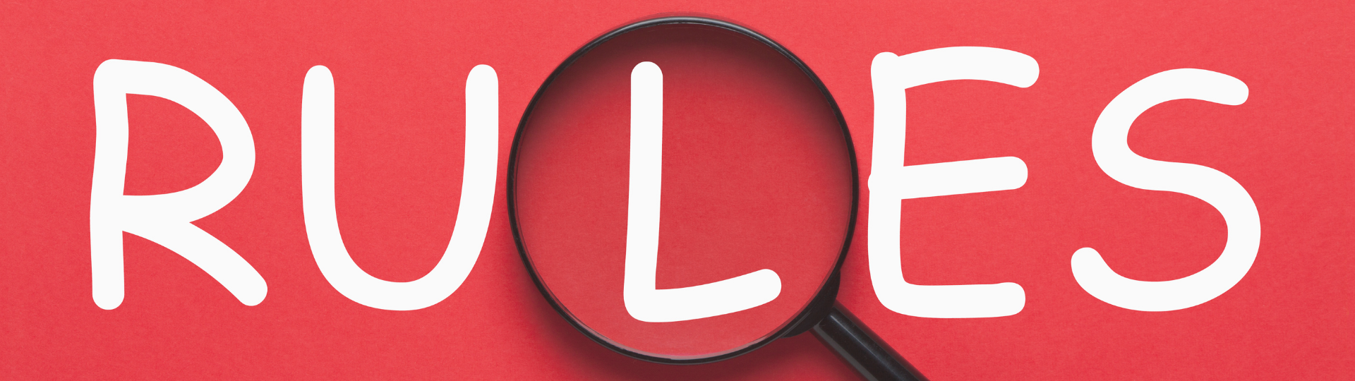 The inscription "Rules" with a magnifying glass above the letter L