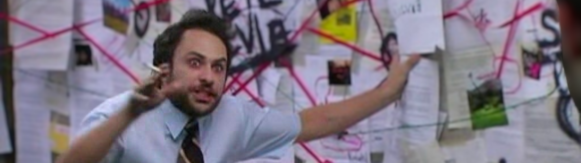 Meme with a mad man with a wall covered by papers behind him