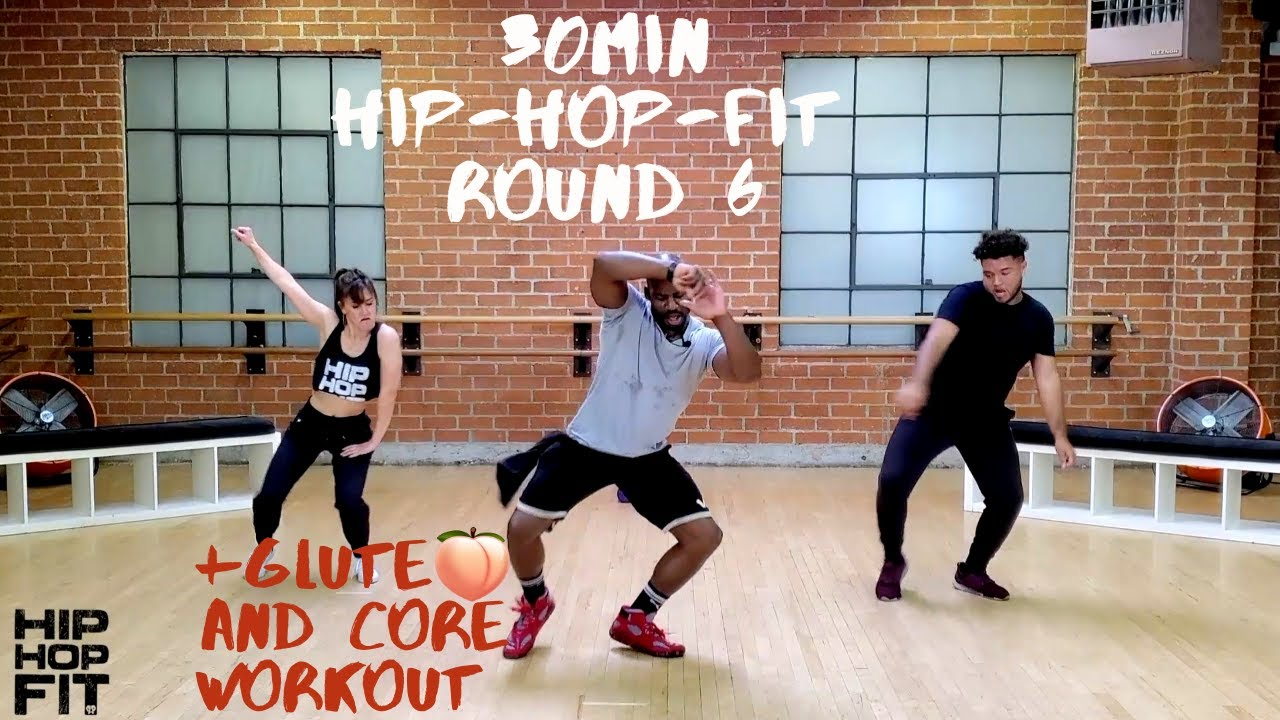Fitness trainer Mike Peele doing a workout with two other persons