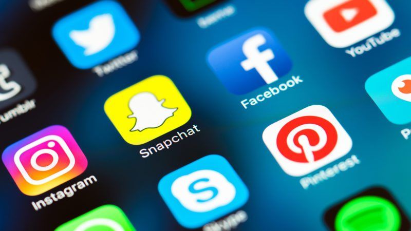 Logos of social media networks on the mobile phone screen