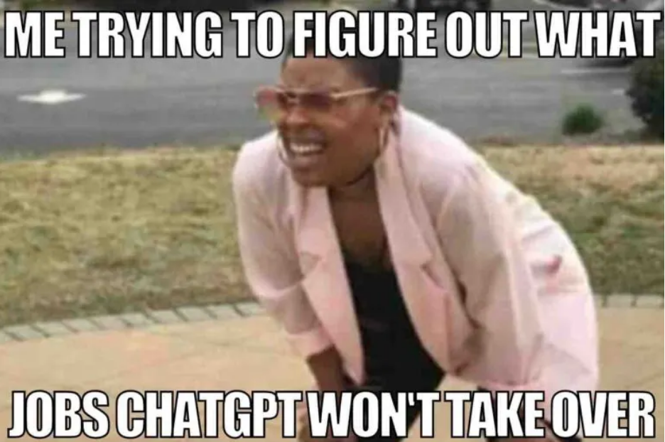 A meme with a dark-skinned woman with glasses who leaned over and squinted to look at something, and the inscription "Me trying to figure out what jobs ChatGPT won't take over"